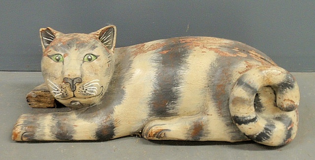 Appraisal: - Large folk art paint decorated reclining cat As found