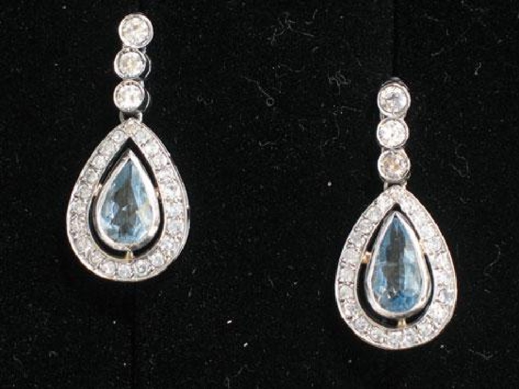 Appraisal: A PAIR OF AQUAMARINE AND DIAMOND DROP EARRINGS the three