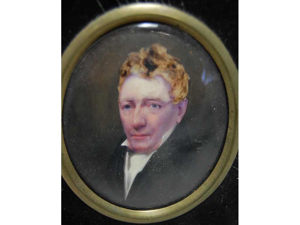 Appraisal: th century oval portrait miniature of a gentleman with blond