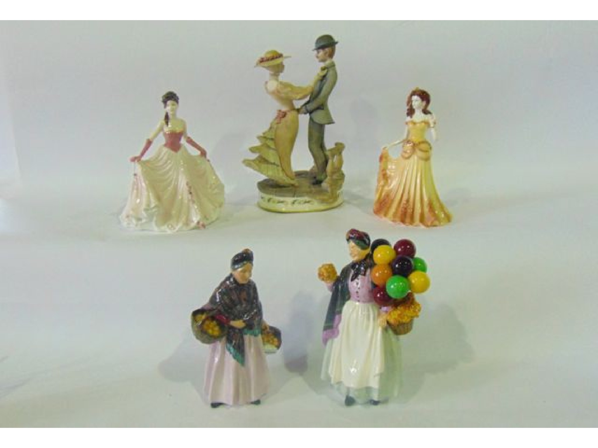 Appraisal: Two Royal Doulton figures - The Orange Lady HN and