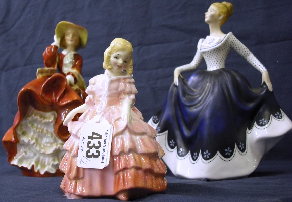 Appraisal: Royal Doulton Figures Top o' the Hill Hn and Rose