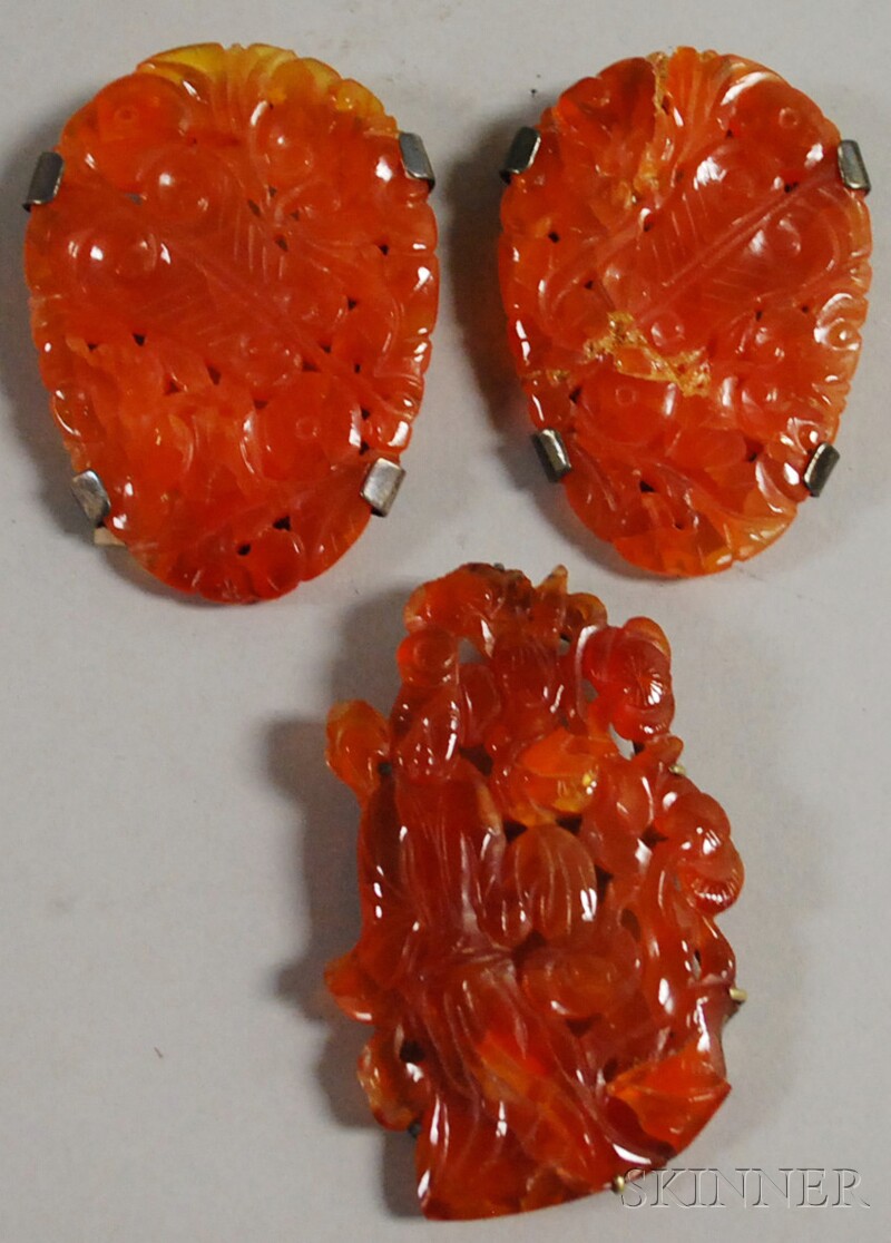 Appraisal: Three Chinese Carved Orange Red Jade Brooches