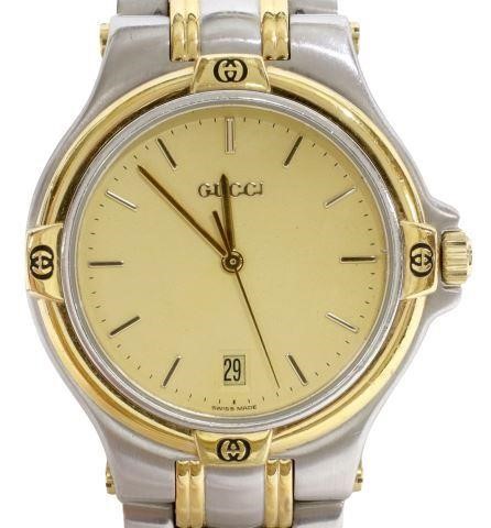 Appraisal: Gucci stainless steel wristwatch model M gold-tone dial with baton