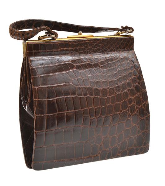 Appraisal: A VINTAGE HANDBAG BY SALVATORE FERRAGAMO Styled in crocodile leather