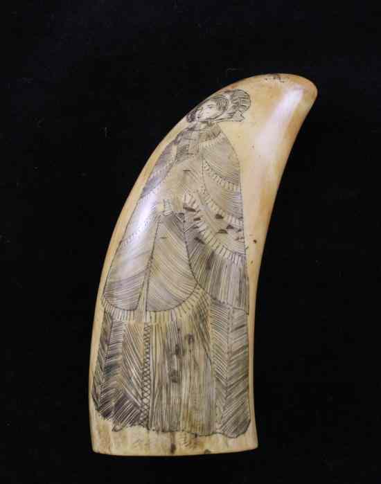 Appraisal: A Scrimshaw sperm whale tooth one side decorated with a