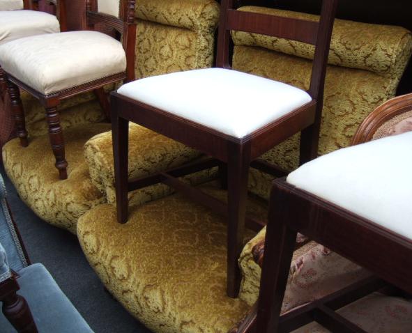 Appraisal: A pair of th century armchairs with outswept arms and