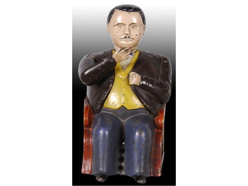 Appraisal: Tammany Cast Iron Mechanical Bank Description Brown jacket version Manufactured