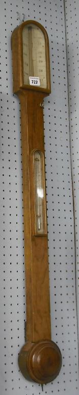 Appraisal: Walnut stick barometer the ivory register signed C Baker High