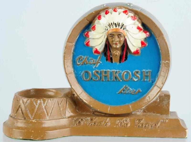 Appraisal: Chalkware Chief Oshkosh Beer Barback Display Bottle is not included