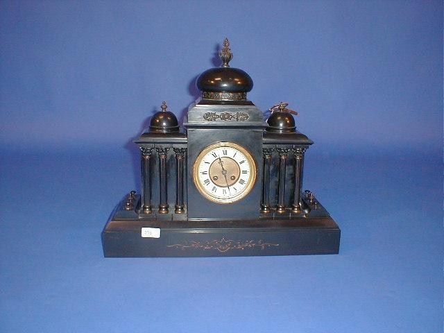 Appraisal: A Victorian black slate architectural mantel clock with eight day