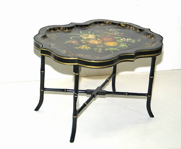 Appraisal: A Victorian lacquered polychrome decorated papier mache tray on stand