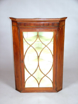 Appraisal: A mahogany and satinwood inlaid corner cabinet early th century