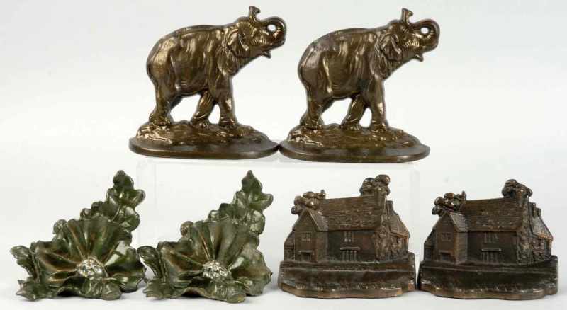 Appraisal: Lot of Pairs of Cast Iron Bookends Description Includes elephants