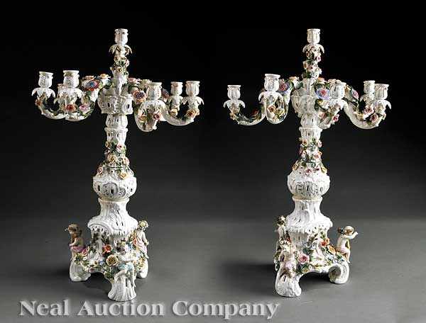 Appraisal: A Pair of Dresden Porcelain Seven-Light Candelabra each encrusted with