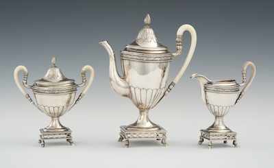 Appraisal: A Continental Three-Piece Silver Coffee Service The three urn-shape pieces