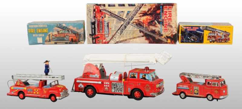 Appraisal: Lot of Tin Fire Ladder Truck Toys Description Japanese Working