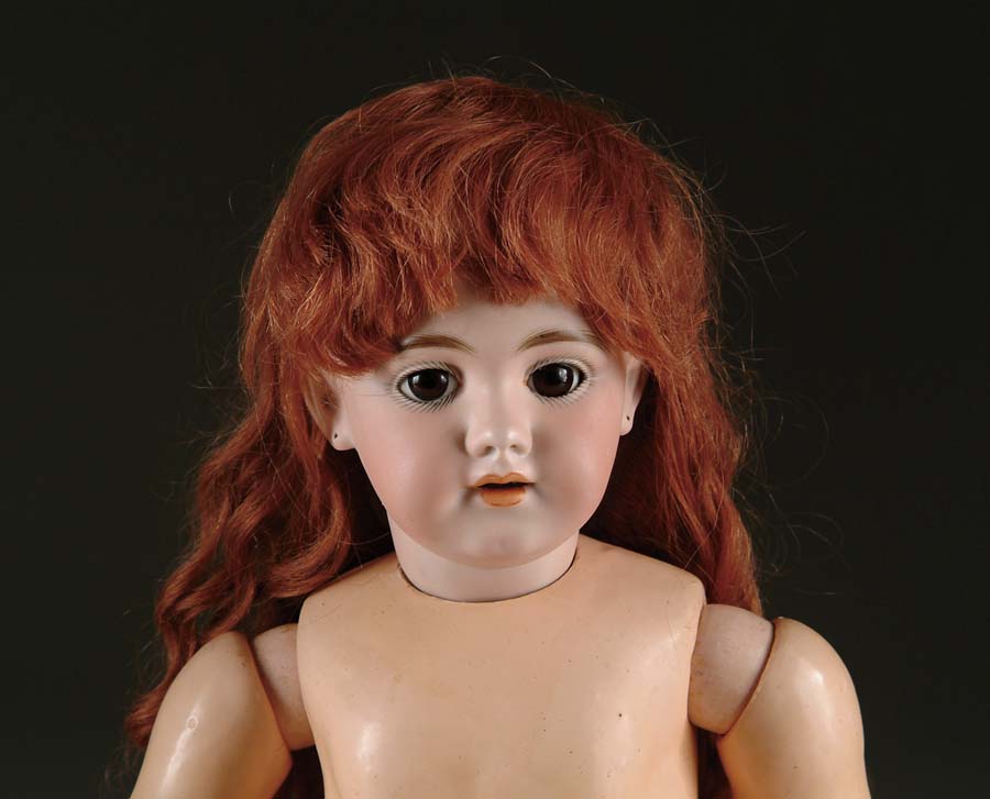 Appraisal: SIMON HALBIG DOLL Bisque head with brown glass sleep eyes