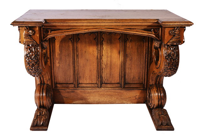 Appraisal: A GOTHIC REVIVAL INVERSE BREAK FRONTED PIER TABLE the supports