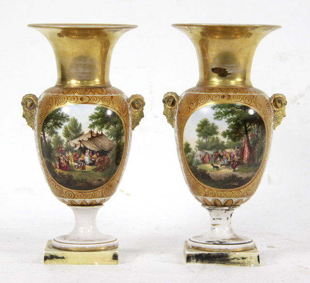 Appraisal: A pair of Paris porcelain urns circa with satyr mask