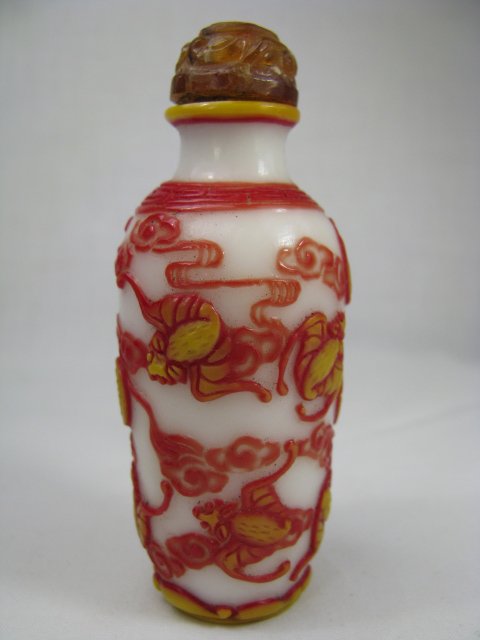 Appraisal: Chinese white cylinder glass snuff bottle with two colored glass