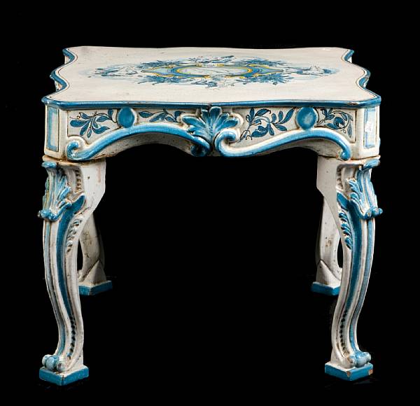 Appraisal: An Italian glazed earthenware side table height in width in