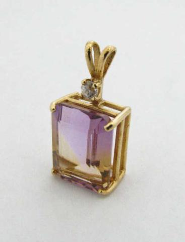 Appraisal: K Yellow Gold Amethyst Pendant Emerald cut stone measures approximately