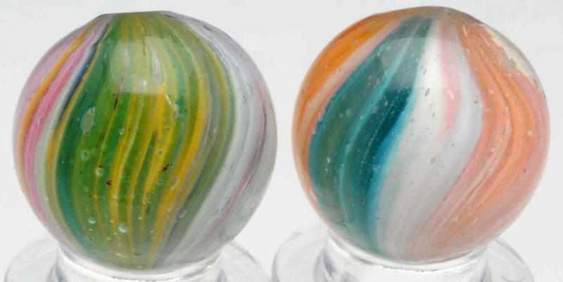 Appraisal: Lot of Onionskin Marbles Lot of two multicolor onionskin marbles