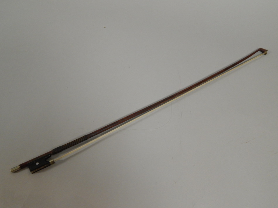 Appraisal: A violin bow stamped Guillaume Fourier Paris with nickel silver