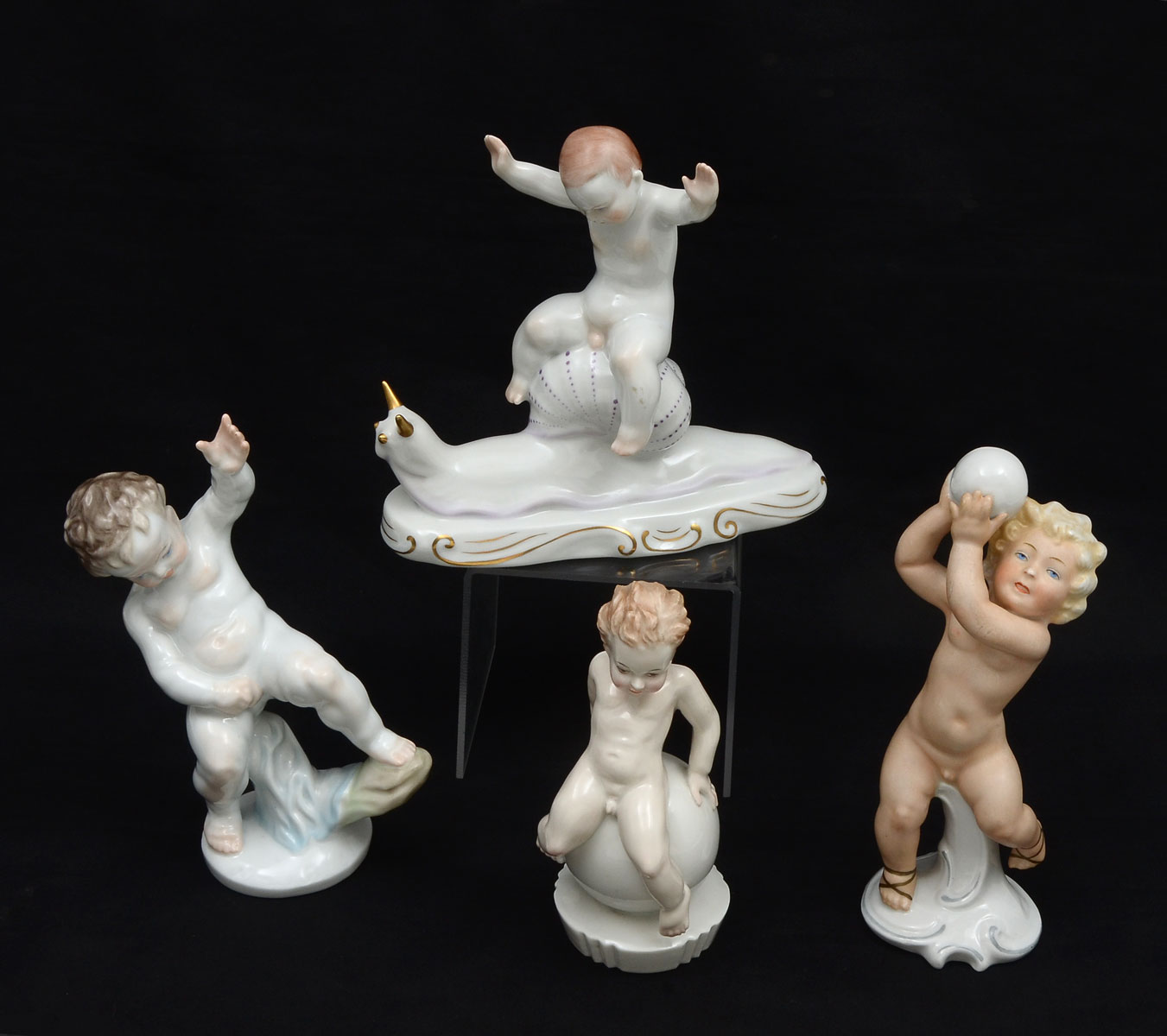 Appraisal: PLAYFUL RUBENESQUE BOY PORCELAIN FIGURES Herend Cherub Boy measures ''