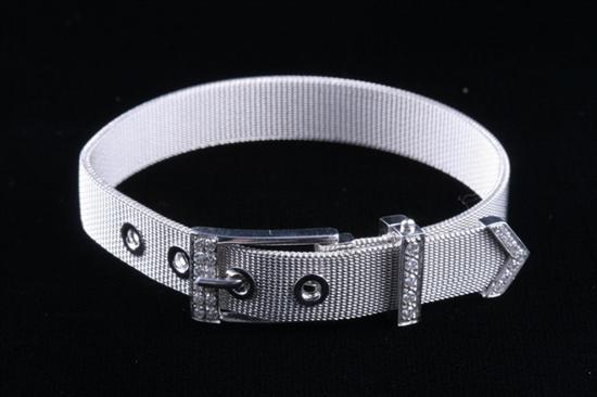 Appraisal: ART DECO K WHITE GOLD AND DIAMOND STRAP BRACELET Circa