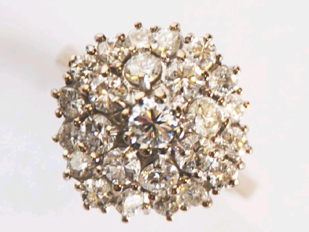 Appraisal: ct GOLD AND DIAMOND DOMED CLUSTER RING the centre stone