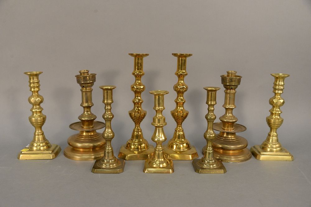 Appraisal: Group of nine brass candlesticks two pairs of th C