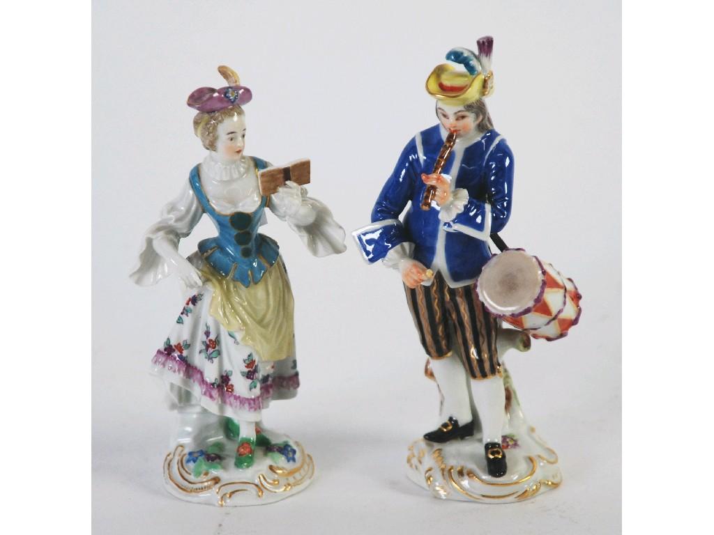 Appraisal: PAIR OF TWENTIETH CENTURY MEISSEN PORCELAIN FIGURES of musicians woman