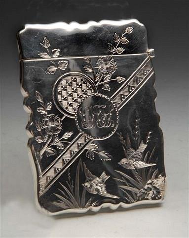 Appraisal: A SILVER CARD CASE engraved with finches on bamboo stalks