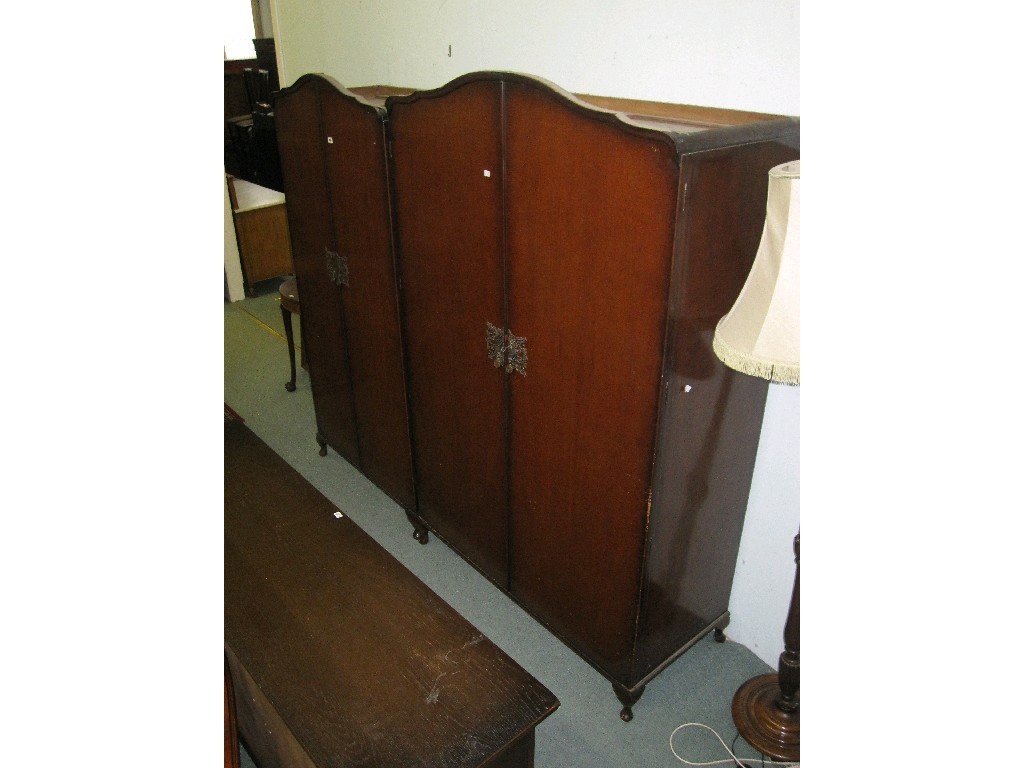 Appraisal: Mahogany veneered ladies and gents wardrobes