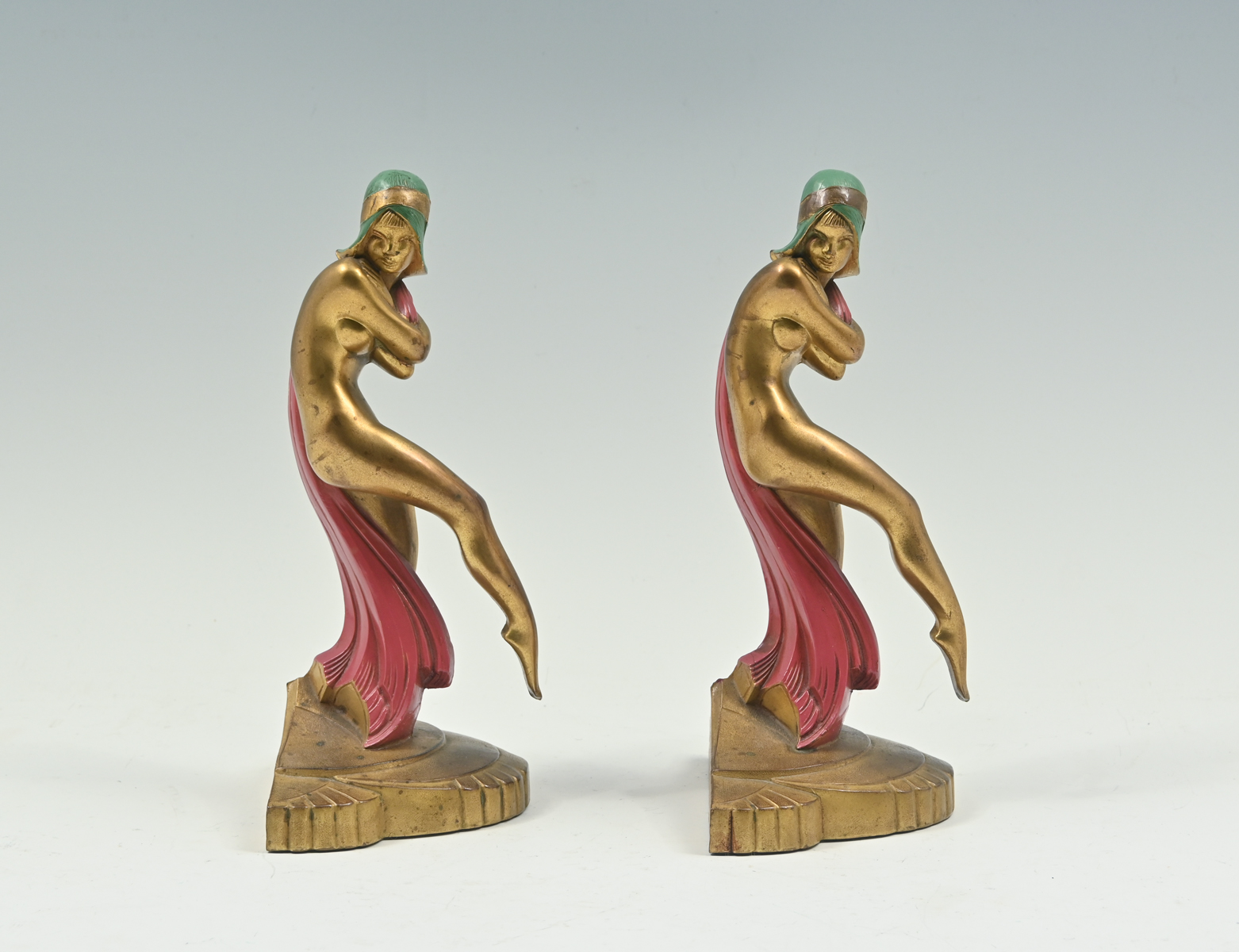 Appraisal: ART DECO NUDE FEMALE BOOKENDS Polychromed Nude Female Bookends by