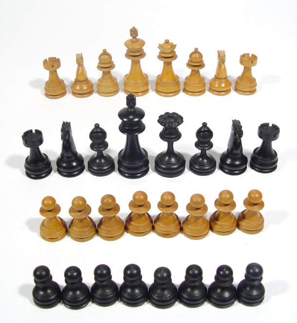 Appraisal: Wooden chess set with ebonised and polished pieces the king