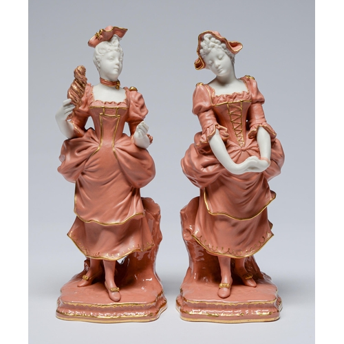 Appraisal: A pair of Mintons white and coral parian figures standing