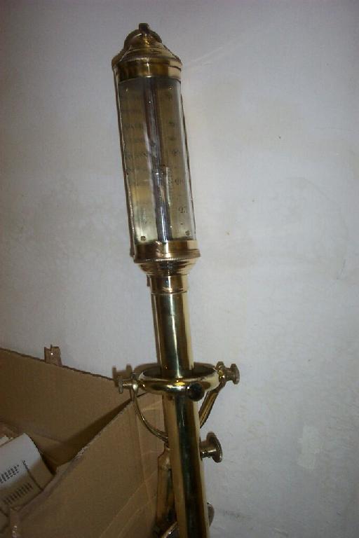 Appraisal: A gimbal mounted brass barometer from the SS Olympus -