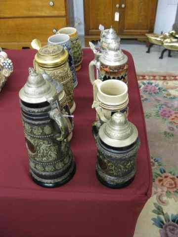 Appraisal: Pottery Steins Mugs post-war to modern assorted sized tallest is