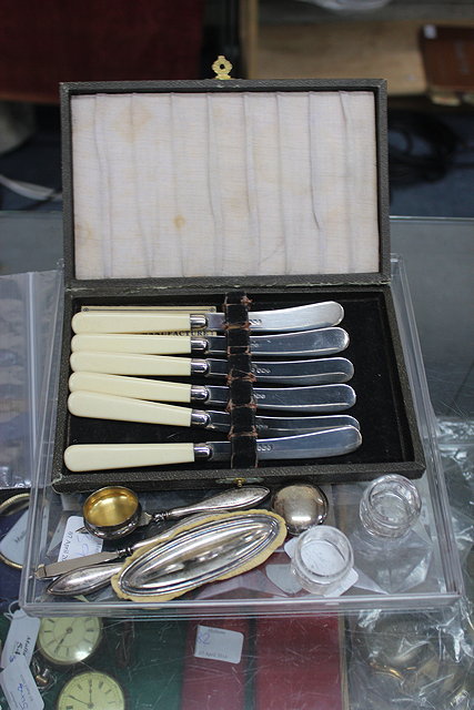 Appraisal: SIX SILVER BLADED TEA KNIVES together with a silver mounted