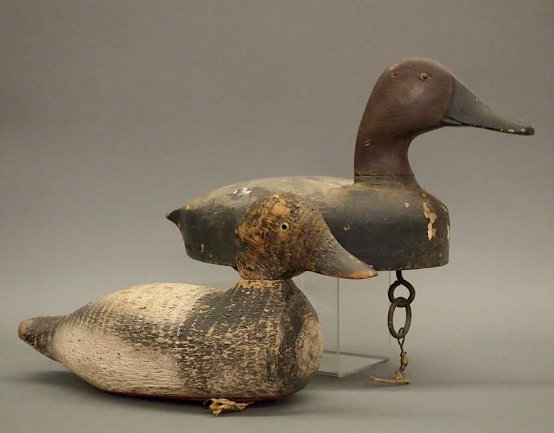 Appraisal: duck decoys Two early th century carved and painted wood