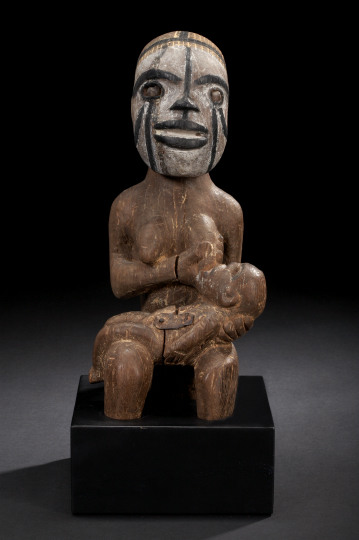 Appraisal: Idoma Peoples Seated Maternity Figure Nigeria the wood seated female