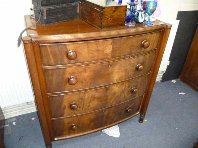 Appraisal: A VICTORIAN MAHOGANY BOW FRONTED CHEST of four long drawers