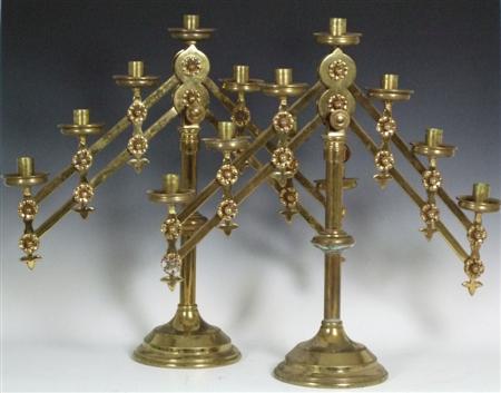 Appraisal: GOTHIC REVIVAL SET OF FOUR ARTICULATED ALTAR CANDLESTICKS S brass