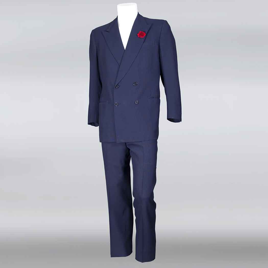 Appraisal: Navy Double-Breasted Suit With peaked lapels labeled Stovel Mason Ltd