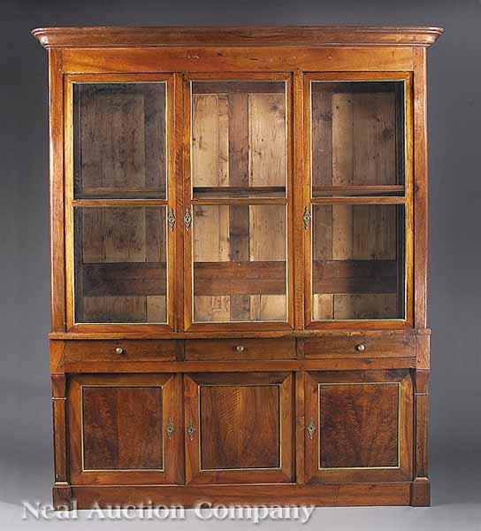 Appraisal: A Louis Philippe Fruitwood Biblioth que th c molded cornice