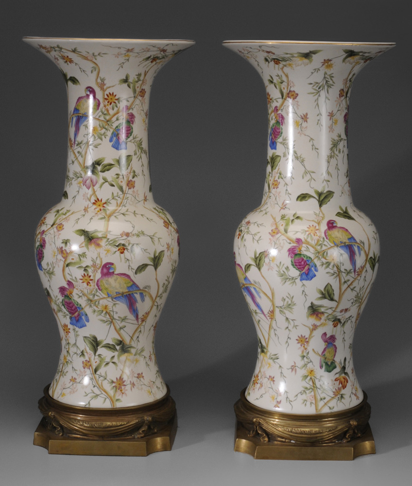 Appraisal: Pair Hand-Painted Porcelain Urns on Bronze Ped