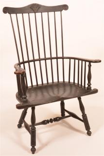 Appraisal: Reproduction Philadelphia Comb Back Armchair Carved shell on crest rail