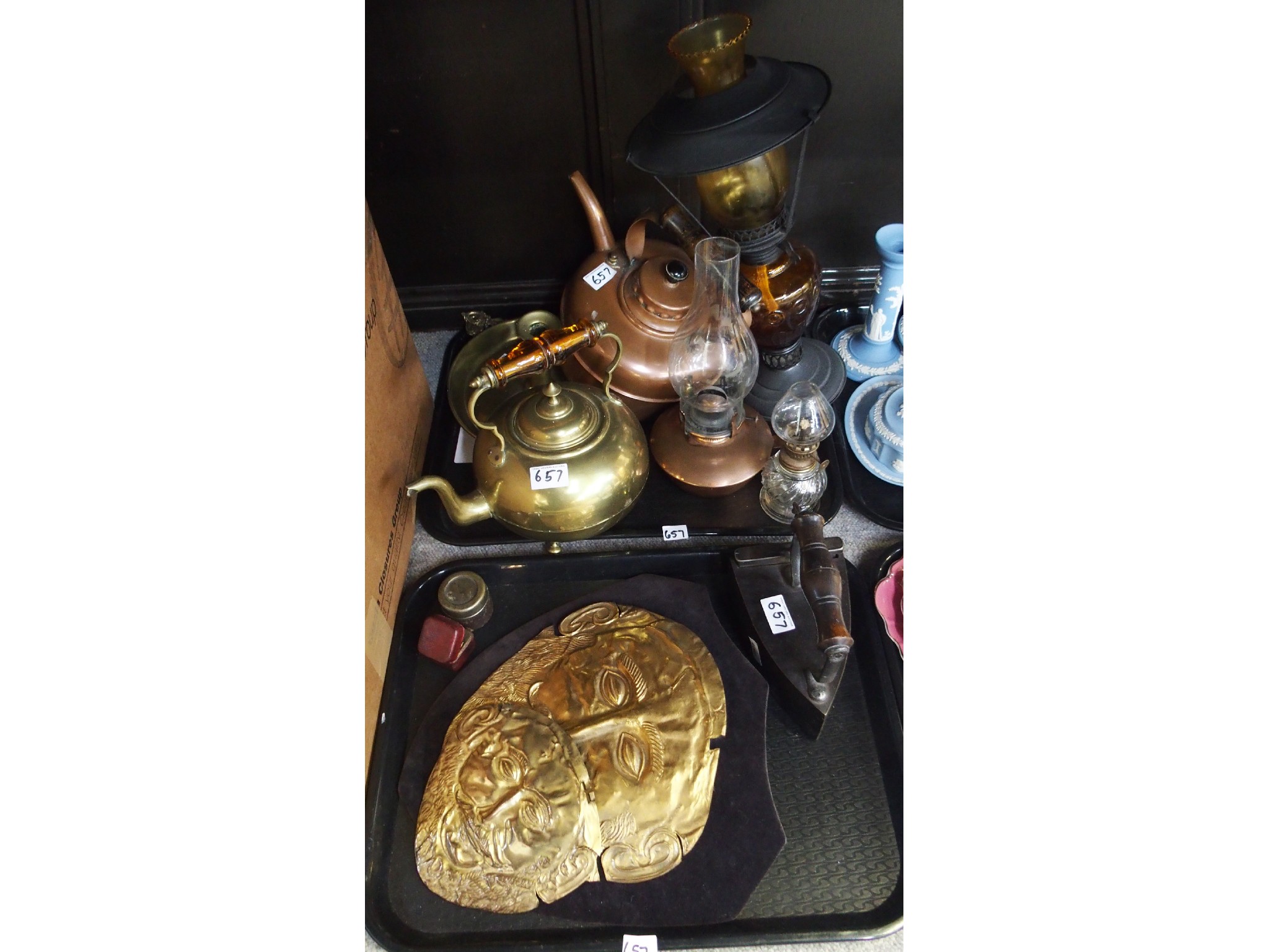 Appraisal: Two trays comprising brasswares including a kettle chamberstick copperwares including